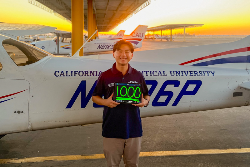 CAU student reaching 1000 flight hours